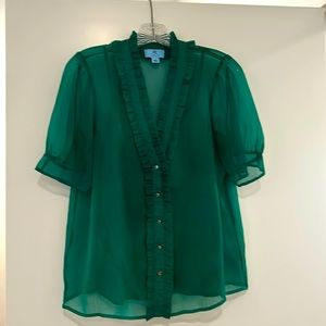 Feminine, emerald green blouse